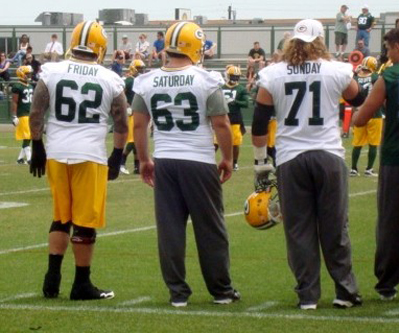 Evan Dietrich-Smith (left) and Josh Sitton (right) decided to have a little fun with Jeff Saturday by tweaking their jerseys during the Packers 2012 training camp.  BFF.